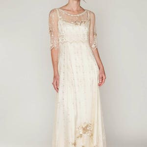 Boho-Style wedding dress of embroidered netting over a double silk satin slip dress, sweep train, mid-length sleeve, vintage/Hippie Inspired