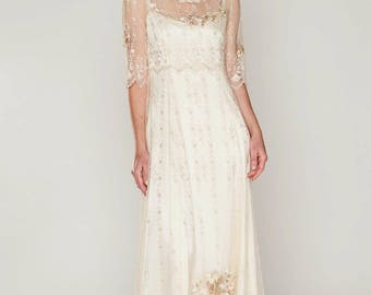 Boho-Style wedding dress of embroidered netting over a double silk satin slip dress, sweep train, mid-length sleeve, vintage/Hippie Inspired