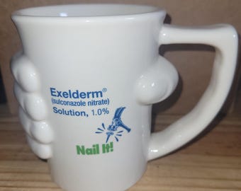 Vintage Exelderm Solution Pharmaceutical Advertising Mug with Molded Hand