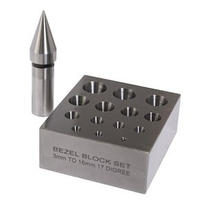 May include: A silver bezel block set with 17 different sized bezel settings. The set includes a pointed tool for setting bezels. The block has the text "BEZEL BLOCK SET 3mm TO 16mm 17 DIGREE" engraved on the side.