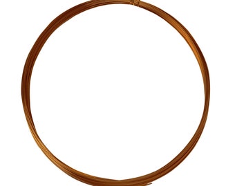 May include: A coil of copper wire, wound into a circle, on a white background.