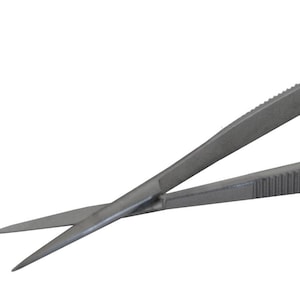May include: A pair of silver surgical scissors with a curved handle and a serrated grip.