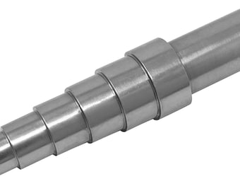 May include: A set of metal ring sizers, stacked in a graduated size order. The sizers are made of silver-toned metal and are used to determine the correct ring size.