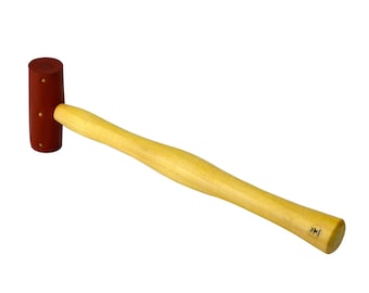 May include: A red rubber mallet with a wooden handle. The handle has a brown label with a logo on it.
