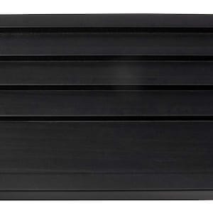 May include: Black wooden display stand with five rectangular slots. The stand is ideal for displaying small items such as jewelry, coins, or other collectibles.