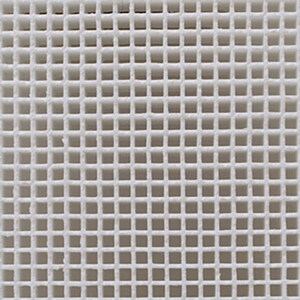 May include: White ceramic tile with a grid pattern of small squares.