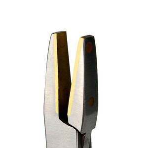 May include: Close-up of jewellery pliers with silver blades and gold-coloured inserts. The pliers have a black handle and are designed for precision work. The blades are sharp and angled, ideal for cutting or shaping metal.