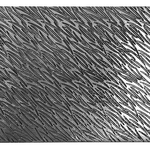 May include: A silver metal sheet with a textured surface. The texture is made up of many small, thin lines that are arranged in a diagonal pattern.