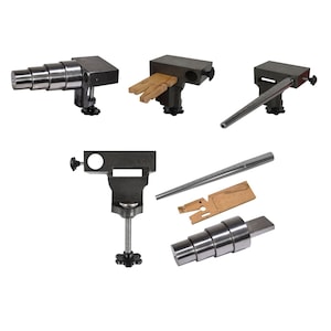 May include: A set of five metal jewelry making tools, including a mandrel, a ring mandrel, a bench vise, and a ring sizing tool. The tools are made of black metal and have a silver finish.