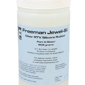 May include: A clear plastic bottle of Freeman Jewel-Sil Clear RTV Silicone Rubber Part A (Base) 909 grams. The bottle label includes information about the product, including the mix ratio, Shore A hardness, and compatibility with HD model material. It also includes instructions for use and safety information.