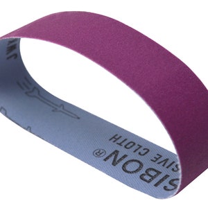May include: A purple sanding belt with the text "SIBON®  SIVE CLOTH" printed on the blue backing.