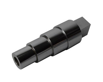 May include: A black metal tool with a square head and a cylindrical body. The body is made up of four sections that are stacked on top of each other, each section being slightly smaller in diameter than the one below it.