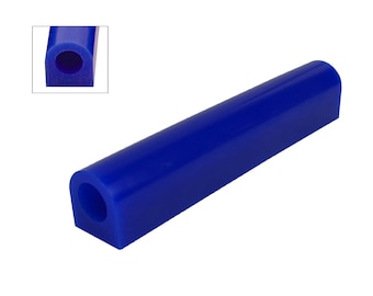May include: A blue wax carving stick with a hollow center. The stick is about 6 inches long and has a rounded end.