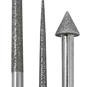 May include: Three silver diamond tipped drill bits for use in a rotary tool. The bits are different shapes and sizes.