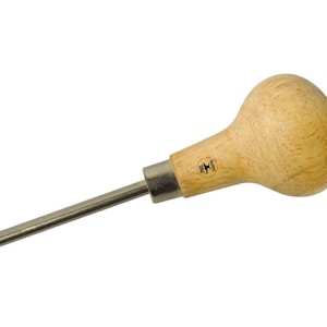May include: A wooden handled metal tool with a long, thin, pointed tip. The handle is a rounded, bulbous shape and has a small, black label with the letter "M" on it.