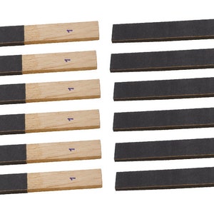 May include: A set of 10 sanding sticks with black sanding surfaces and wooden handles. Each stick is labeled with the number "4".