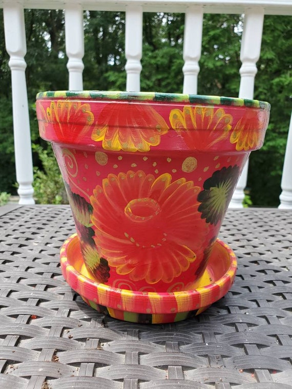 Image of Large terracotta pot with floral design