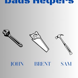 May include: A black and white illustration of three tools: a wrench, a saw, and a hammer. The tools are labeled "John", "Brent", and "Sam" respectively. The text "Dads Helpers" is at the top of the image.