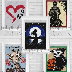 May include: Five framed digital art prints with various designs. The first print features a red heart with black butterflies. The second print features a silhouette of a woman standing on a beach with a full moon in the background. The third print features a silhouette of a person riding a horse. The fourth print features a cartoon giraffe with the text "my blood type is coffee". The fifth print features a cartoon grim reaper holding a pumpkin.