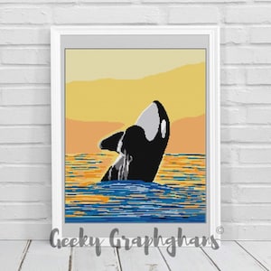 May include: A black and white orca whale jumps out of the water against a yellow and orange sunset background. The water is blue and green.
