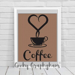 May include: Framed cross-stitch art depicting a black coffee cup with steam forming a heart. The word "Coffee" is stitched in black below the cup. The background is a solid brown colour. The frame is white.