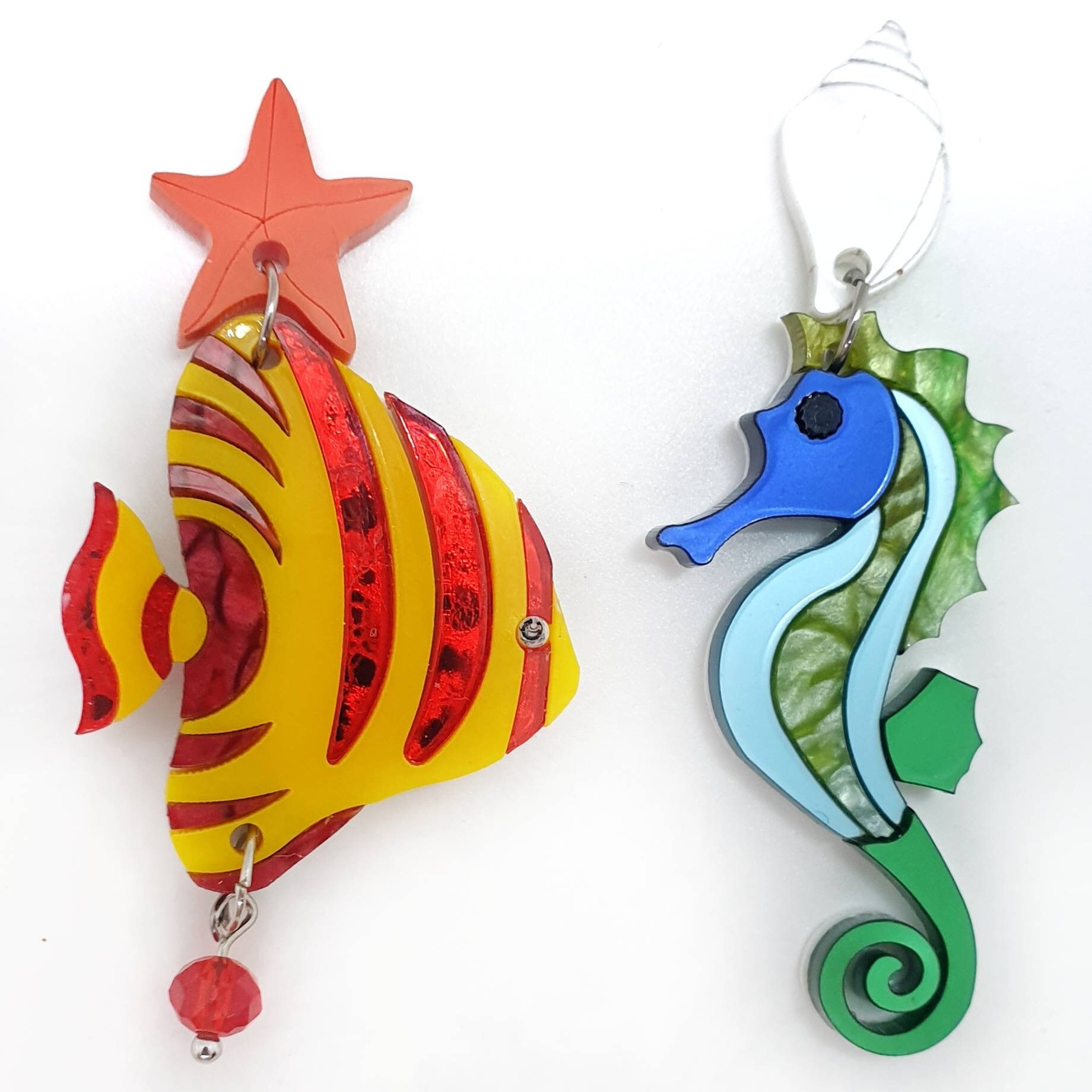 Asymmetrical sea and seahorse earrings in acrylic and plexiglass laser cut
