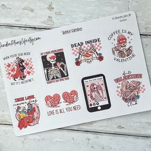 May include: A sheet of stickers featuring skeleton illustrations with Valentine's Day themed messages. The stickers include phrases like "Dead Inside", "True Love Never Dies", "Coffee is My Valentine", and "Love is All You Need".