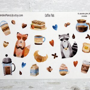 May include: A set of watercolor stickers featuring coffee-themed illustrations. The stickers include a fox, a raccoon, a coffee pot, a cup of coffee, a croissant, a slice of cake, a milk carton, a coffee cup, a heart, a flower, and a coffee bean. The stickers are perfect for adding a touch of whimsy to your planner, journal, or scrapbook.