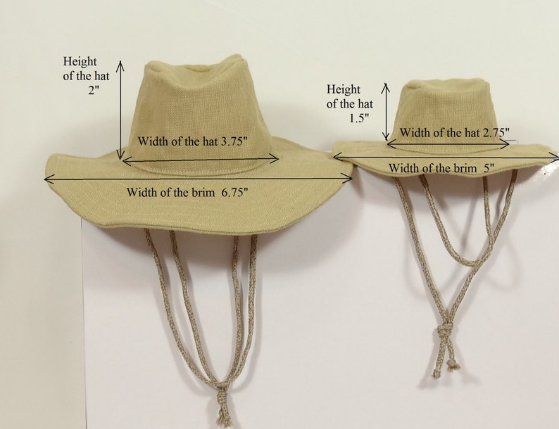 Puede incluir: Dos sombreros de lona beige con alas anchas. El sombrero m&aacute;s grande tiene un ancho de ala de 17,1 cm y una altura de sombrero de 5,1 cm. El sombrero m&aacute;s peque&ntilde;o tiene un ancho de ala de 12,7 cm y una altura de sombrero de 3,8 cm.