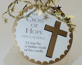 The Cross Of Hope Pin Candle - One of many different cross of hope pins are hidden inside the candle.