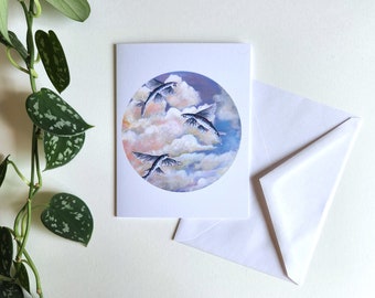 Greeting card of flying fish in the sky