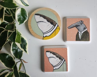 Small paintings of animals wearing clothes
