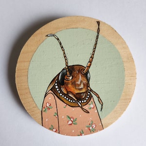 Small paintings of animals in clothing image 2