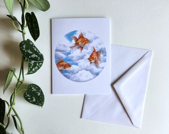 Greeting card of goldfish in the sky