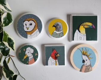 Small paintings of birds in clothing