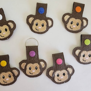 Embroidered faux leather monkey keychain