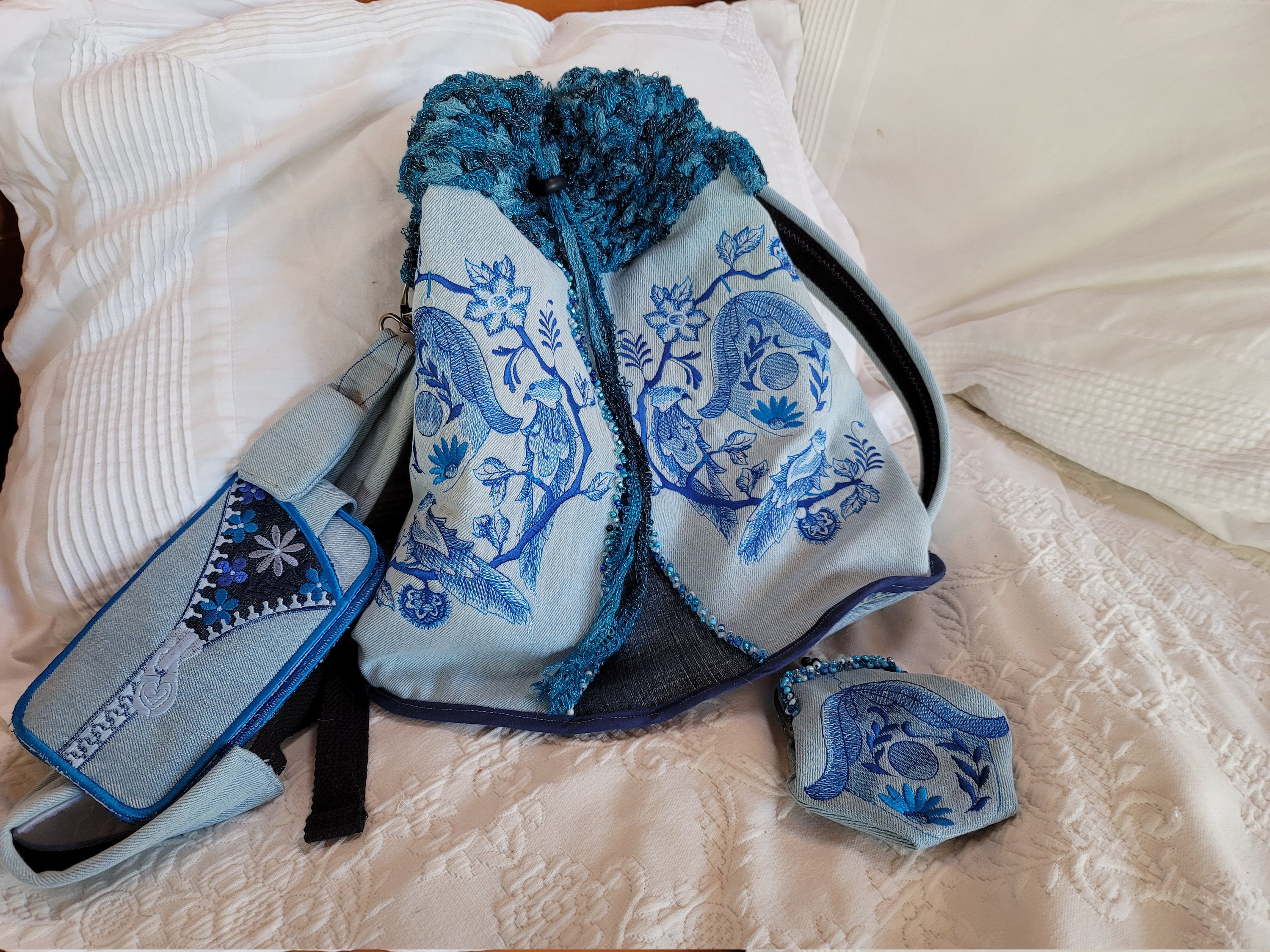 Upcycled, Embroidered, beaded Denim, backpack bundle, includes coin purse, phone wallet, lip balm fob, crocheted top, & toggled closure.