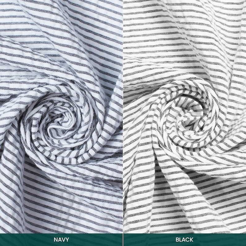 May include: Two fabrics, one navy and one black, with white horizontal stripes, are shown rolled up. The navy fabric is labelled "NAVY" and the black fabric is labelled "BLACK". The image highlights the texture and pattern of the textiles.