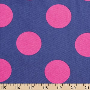 May include: A blue fabric with large pink polka dots. The fabric is measured in inches.