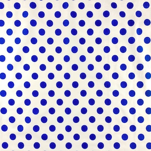 May include: White fabric with a repeating pattern of blue polka dots.