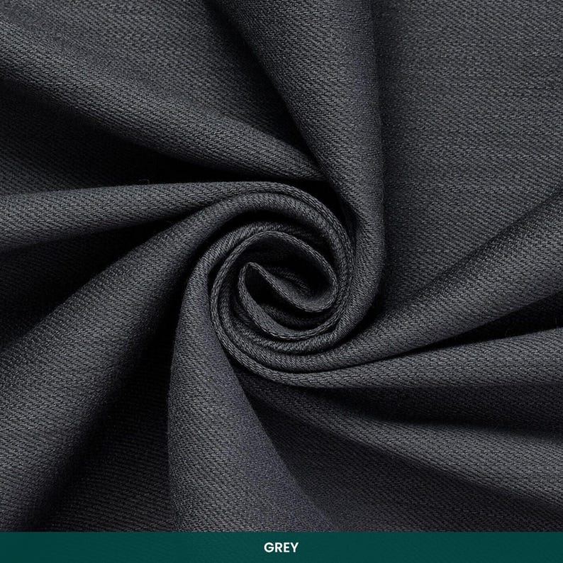 May include: Close-up of a swatch of gray fabric, tightly swirled to show texture and depth. The fabric has a subtle diagonal weave pattern. The word "GREY" is displayed in a green bar at the bottom of the image.