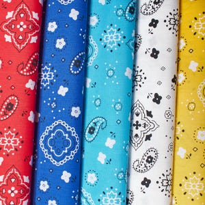 May include: Five fabric swatches with a bandana print. The swatches are red, blue, turquoise, white, and yellow. Each swatch has a different bandana pattern.