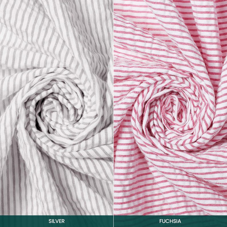 May include: Two fabric samples, one silver and one fuchsia, both with a striped pattern. The silver fabric has grey and white stripes, while the fuchsia fabric has red and white stripes. The fabrics are arranged in a spiral.