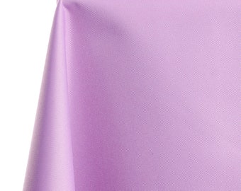 May include: A close-up of a light purple tablecloth with a smooth, textured surface.