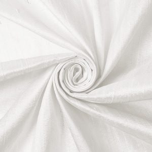 May include: White silk fabric with a smooth, flowing texture. The fabric is arranged in a spiral pattern, creating a soft, elegant look.