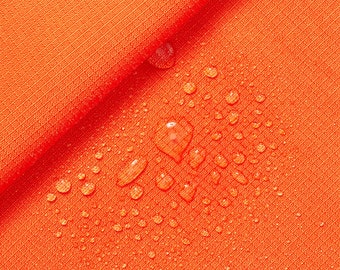 Tkanina Ottertex® Polyester Ripstop (powłoka DWR) 200 Denier, 100% poliester, szerokość 58/60 cali, wodoodporna, kolor BTY, pomarańczowy