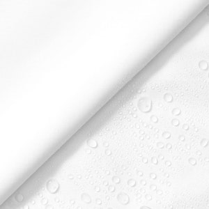 May include: White fabric with a diagonal fold, revealing a surface covered in small, clear water droplets.