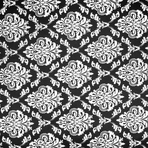 Pode incluir: Um padrão damasco preto e branco com um desenho floral repetitivo.
