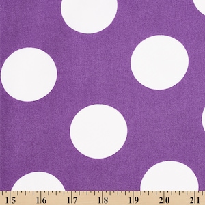 May include: Purple fabric with a white polka dot pattern. The fabric is measured in inches.