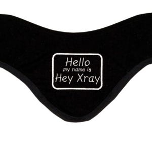 Divertente protezione per la tiroide Xray Tech, "Ciao, mi chiamo Hey Xray"